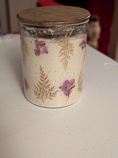 Sourdough starter in floral jar.