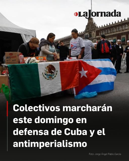Text-photo with Cuba supporters in Mexico behind a table adorned with flags of Cuba and Mexico. 

Text reads: Colectivos marcharán este domingo en defensa de Cuba y el antimperialismo 